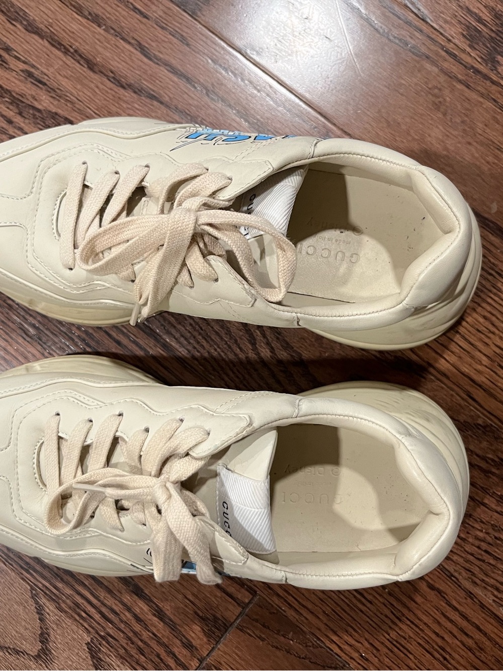 Gucci Cream Leather Sneakers with Light Blue Logo Accent